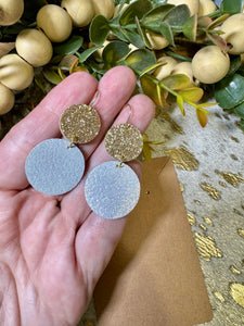 Gold & White leather circle earrings.