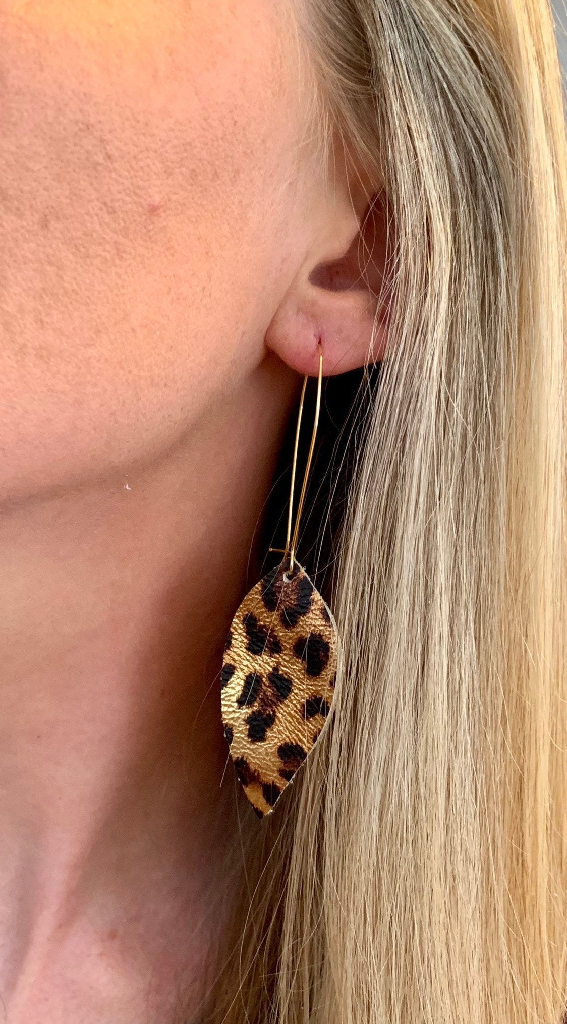 Leather Leopard print earrings, leaf-shaped.