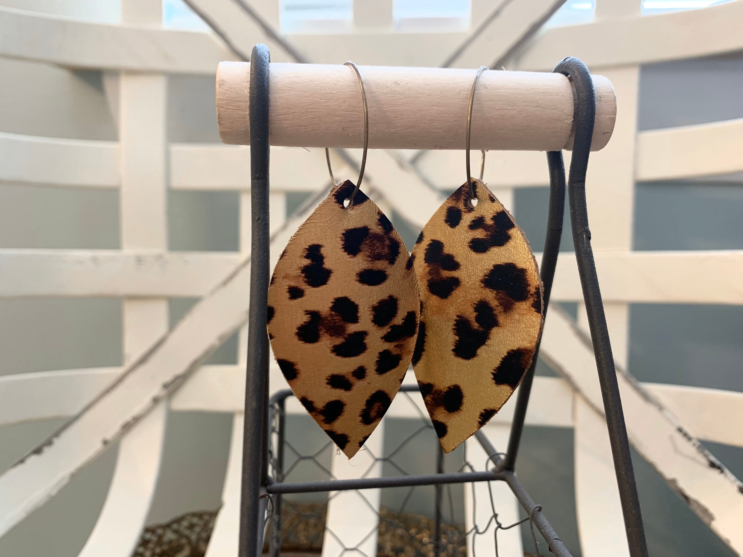 Leather Leopard Print Hoop Earrings. Leather Leaf Shaped Metallic