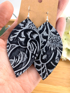 Western print leather earrings. Black and silver leather embossed earrings.