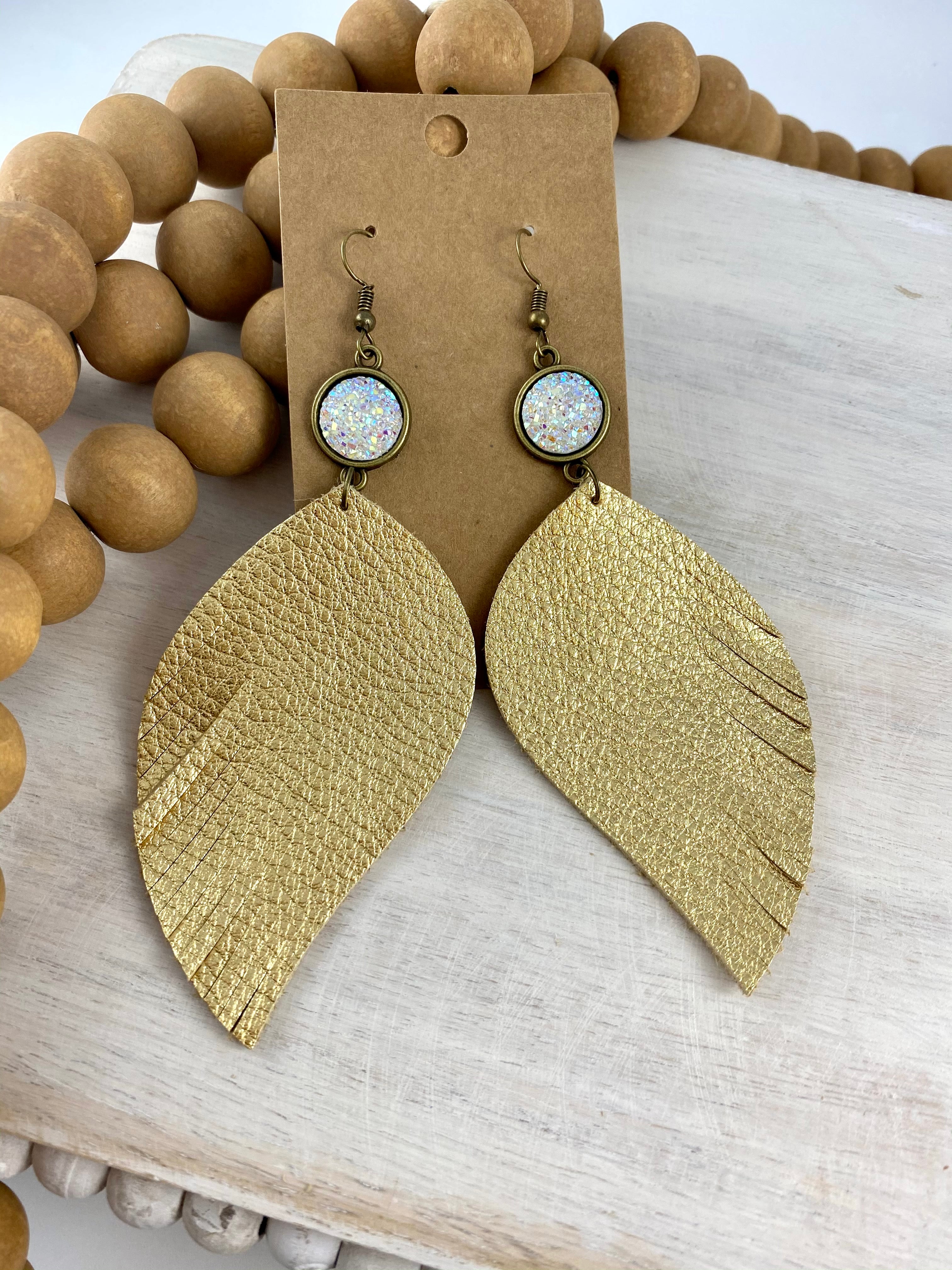 Gold Metallic Leather fringe earrings with iridescent stone.